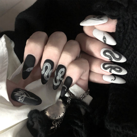 Embrace Edgy Elegance with Dark Snake Pattern Mandarin Duck Wearing Manicure